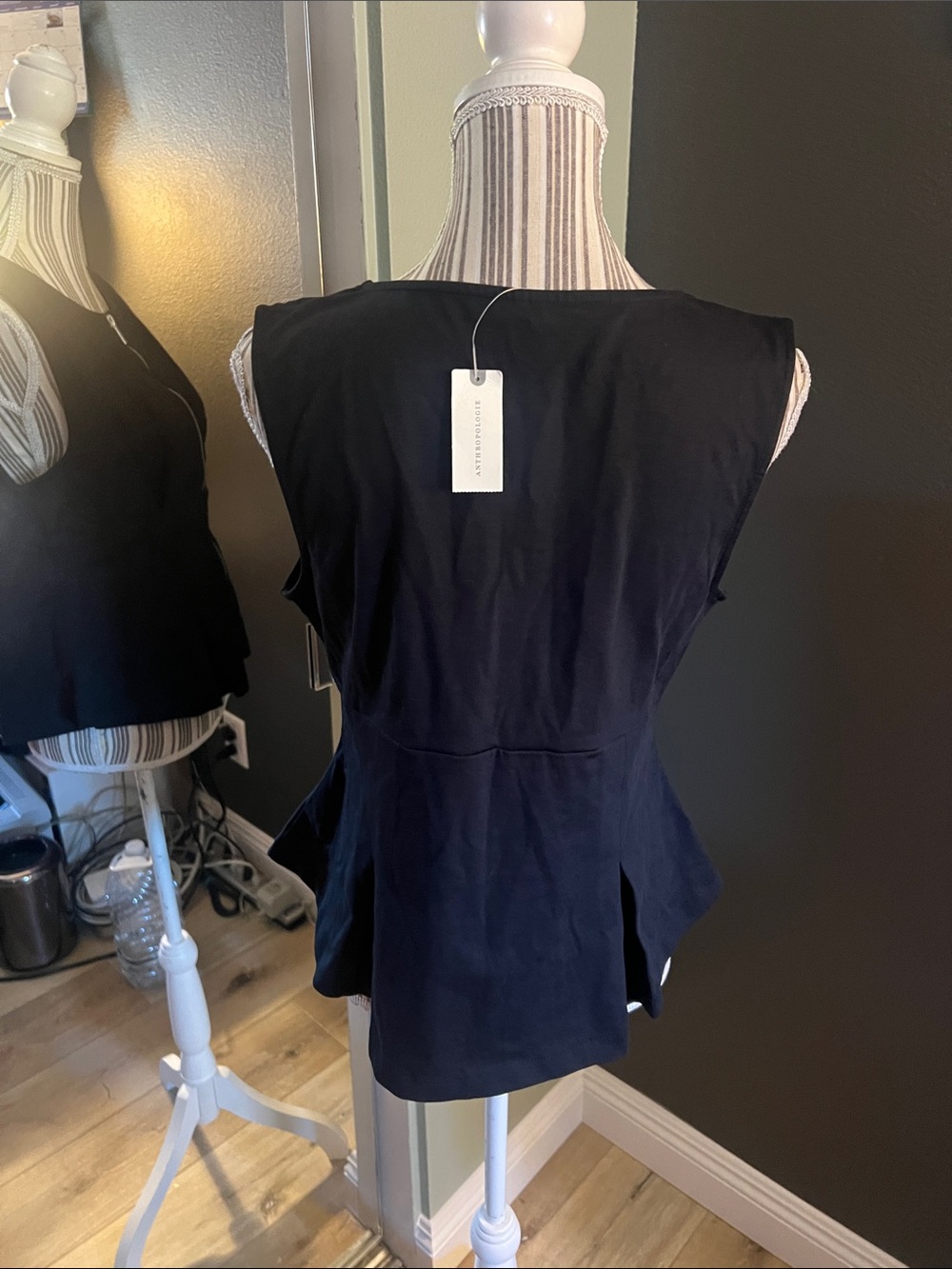 1 hour sale. Anthropologie, Medium Black Sleeveless Zip Front Peplum Top - Picture 6 of 15